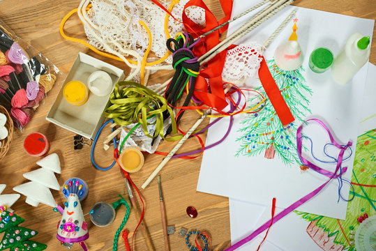 Handmade decorations for new year and other holidays. Artwork workplace with creative accessories.