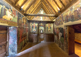Fototapeta na wymiar Interior of Church of Archangel Michael with Historic icon paintings