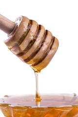 Fototapeta na wymiar natural organic honey on a wooden table
