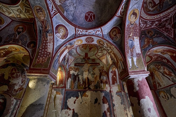 Fototapeta na wymiar Göreme, Cappadocia, Turkey - 350 carved Byzantine churches in the Turkish capital of Cappadocia. Frescos from the period iconoclasm, as well as later, the oldest come from the ninth century.