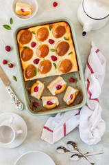 Fototapeta na wymiar Quark, Apricot and Raspberry Cake