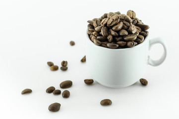 Coffee bean - small cup full of coffee bean isolated on white.