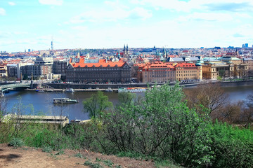 Obraz premium Prague view / panoramic landscape of the czech republic, Prague view with red roofs of houses from above, landscape in the European capital