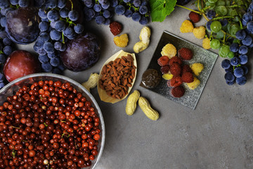 mix of fresh fruits and berries, rich with resveratrol raw food ingredients. nutrition background