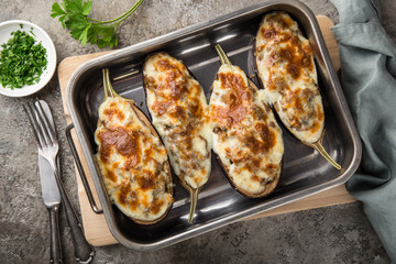 stuffed eggplant with meat, vegetable and cheese - obrazy, fototapety, plakaty