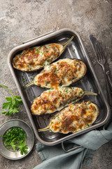 stuffed eggplant with meat, vegetable and cheese