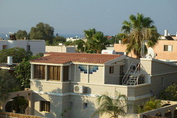 Fototapeta premium View of the sea and mountains from the residential area with the houses of the city of Eilat in Israel