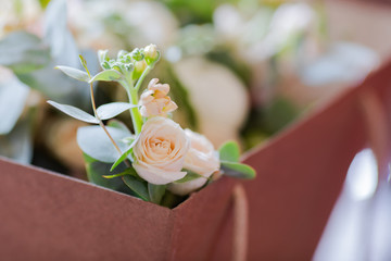Beautiful wedding bouquet delivered in the paper box