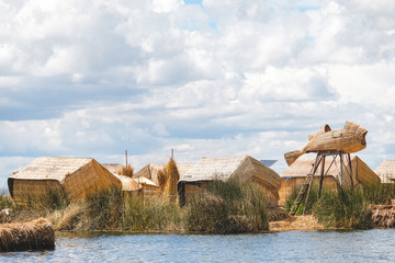 Peru. Uros Island on Lake Titicaca. Straw village located on the island