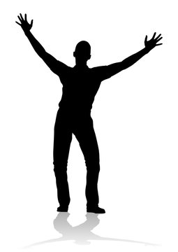A silhouette man with arms raised in praise or triumph