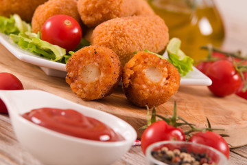 Supplì, italian fried rice balls.