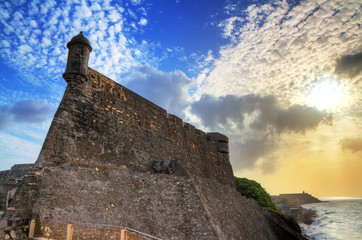 Beautiful view of the large outer wall with sentry box of fort San Cristobal in San Juan, Puerto...