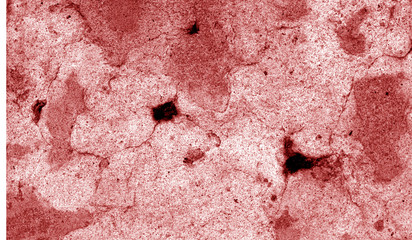 Сraked weathered cement wall texture in red tone.