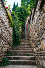 Fototapeta na wymiar Old stone stairs in the Christian monastery.