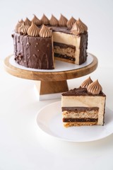 chocolate and hazelnut cake on white background