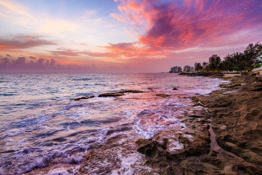 Beautiful sunrise at the rugged coast of the pacific in San Juan, Puerto Rico