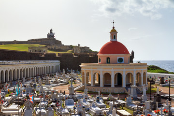 Santa Maria Magdalena de Pazzis Cemetery in San Juan, Puerto Rico, with fort El Morro in the...