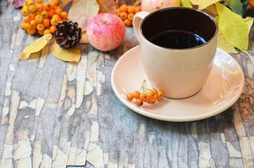 Workspace with golden leaves, notebook, coffee cup. Stylish office desk. Autumn or Winter concept. Flat lay, top view.