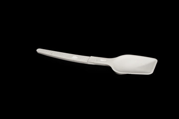 spoon isolated on a black background