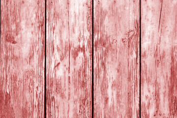 Old grunge wooden fence pattern in red tone.