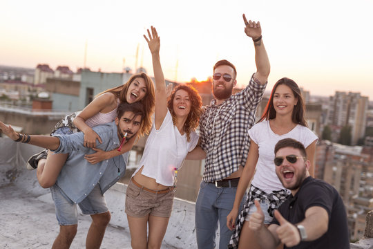 Friends having fun at a rooftop party