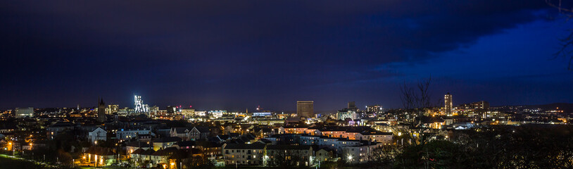Night view of city of Plymouth UK from the South west.