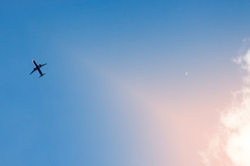 The plane flies in the clouds