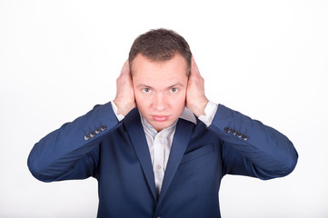 A young businessman covered his mouth with his hands. I can not listen to understand