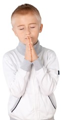 Young boy praying