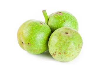 Green walnut on white background