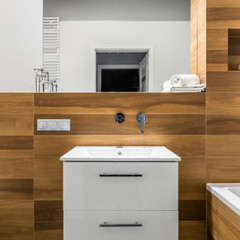 Bathroom with wood tiles