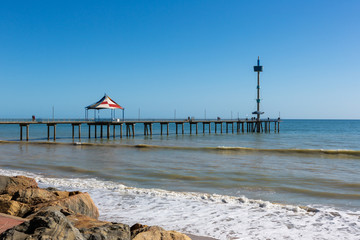 The beautiful Brighton Jetty on a sunny day with blue sky in South Australia on 13th September 2018