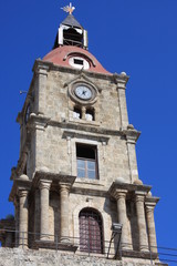 Fototapeta na wymiar Medieval Clock Tower in the city of Rhodes in Rhodes island in Greece