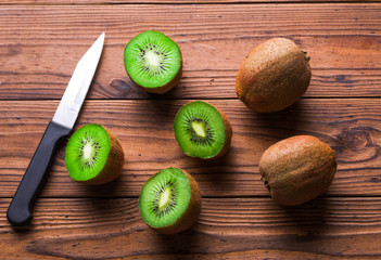 Top view of fresh kiwi fruit on wooden table