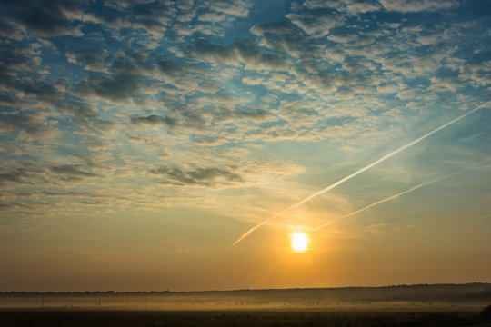 Fototapeta Beautiful sunrise in the open countryside.