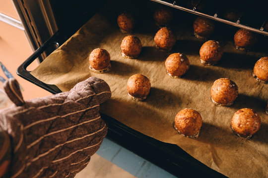 Hot prepared meat balls on baking sheet with paper