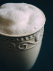 Cup of hot cappuccino coffee with foam