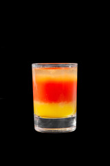 Shot of cocktail isolated black