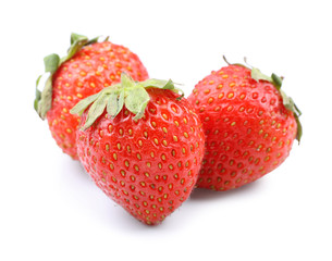 Ripe strawberries on white background