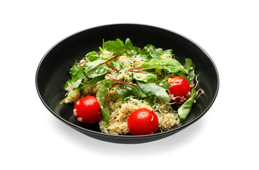 Plate with healthy fresh salad on white background