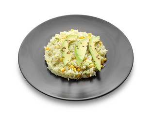 Plate with tasty boiled rice and vegetables on white background