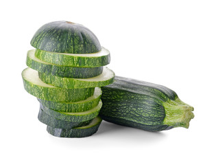 Ripe zucchinis on white background