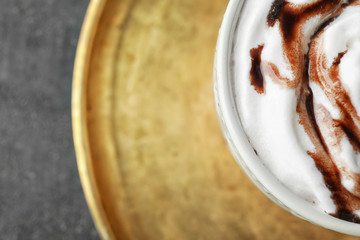 Cup of delicious cocoa with cream, closeup