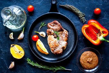 concept cooked steak on dark background top view