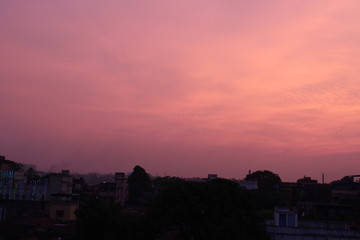 Sunset on the horizon, tinted sky, skyline