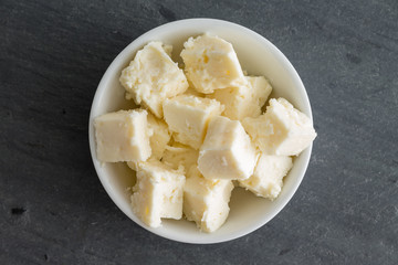 Bowl of creamy crumbly traditional Feta cheese