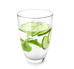 Glass of fresh cucumber water on white background