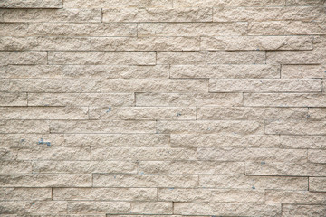 The stone wall texture background natural color.Background of stone wall texture photo.Natural stone wall texture for background.Old Brick texture, Grunge brick wall background.