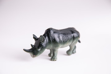 rhino toy on colorful background