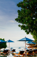 Vacation Relaxation resort beach bed in infinity pool tropical sea view, Phuket Thailand